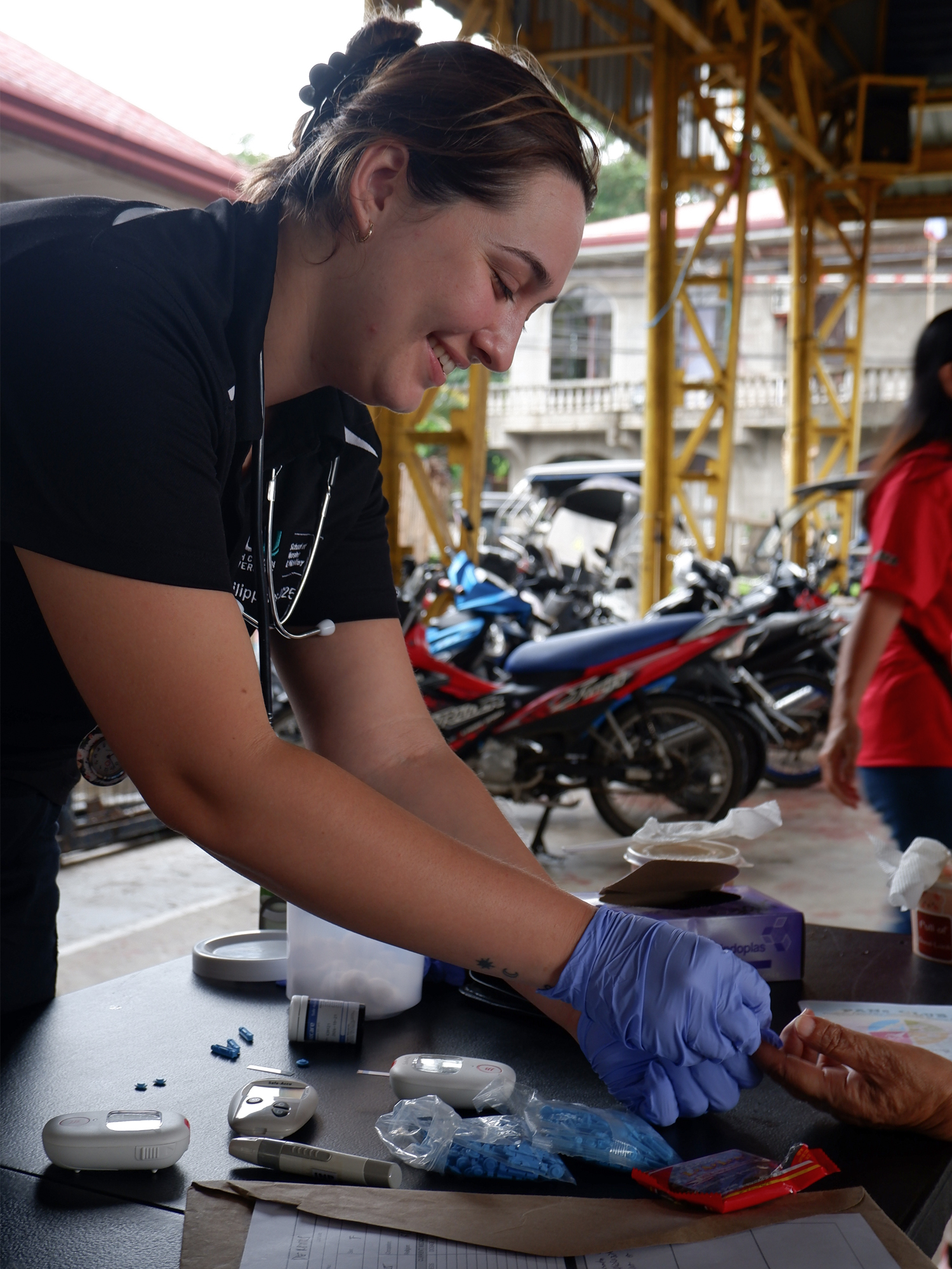A simple touch, a shared smile, and the healing power of presence in the heart of the community